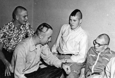 St. Olaf students with shaved heads, as penance for a 1950s homecoming prank