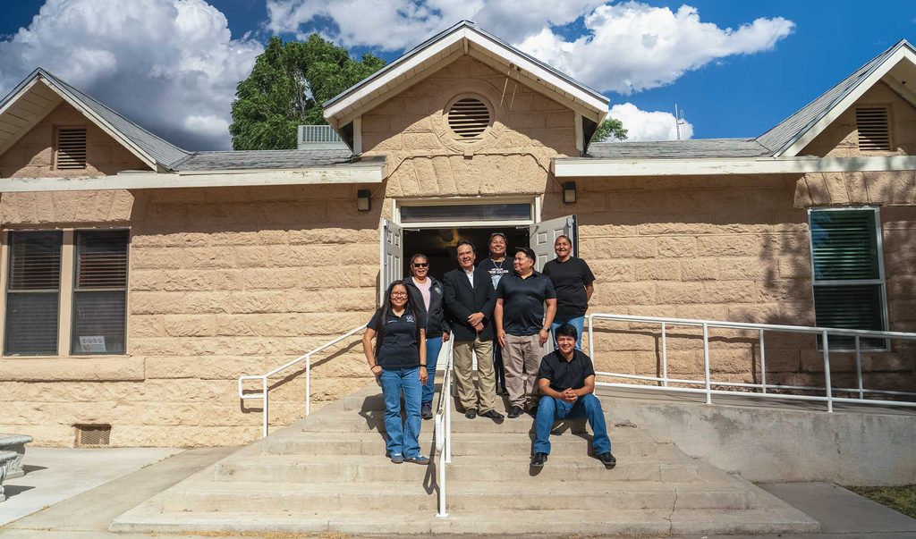 Martín Ahumada with coworkers at Apache College