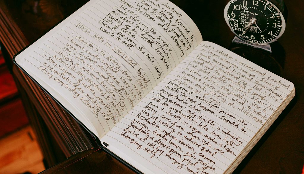 Open notebook filled with handwritten notes