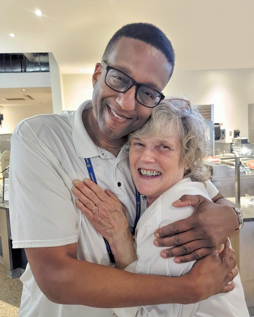 Marc and Debra hugging