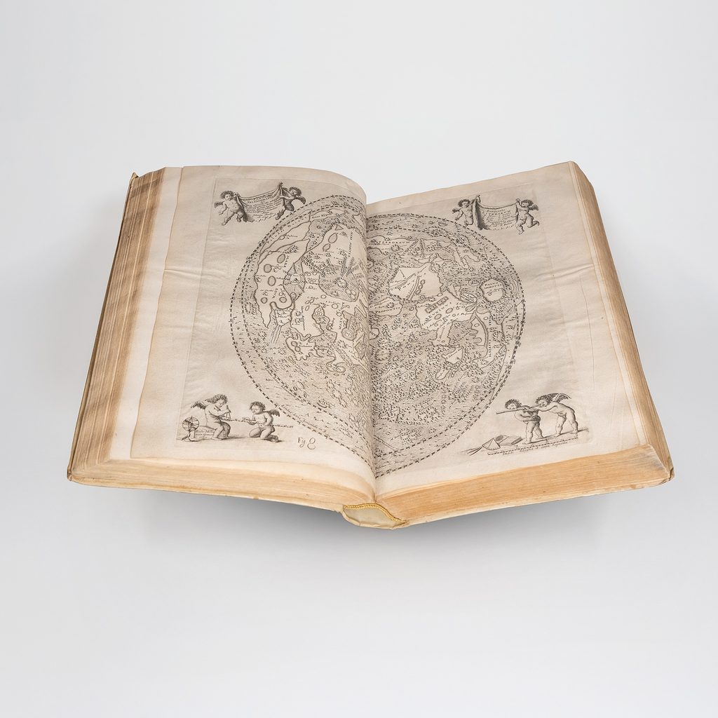 open book with moon illustration