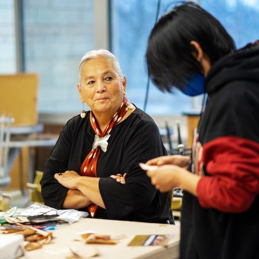 Denise Lajimodiere in a bark-biting workshop