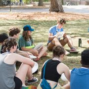 Students gathering with frisbees