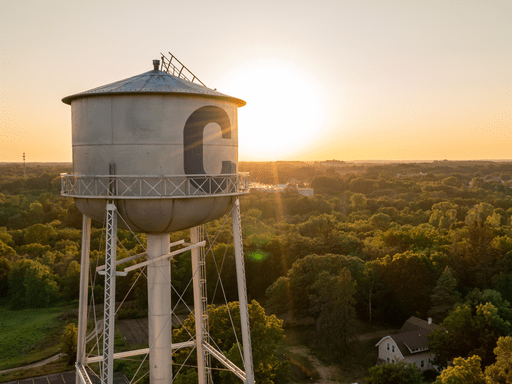 Carleton water tower with a sunset