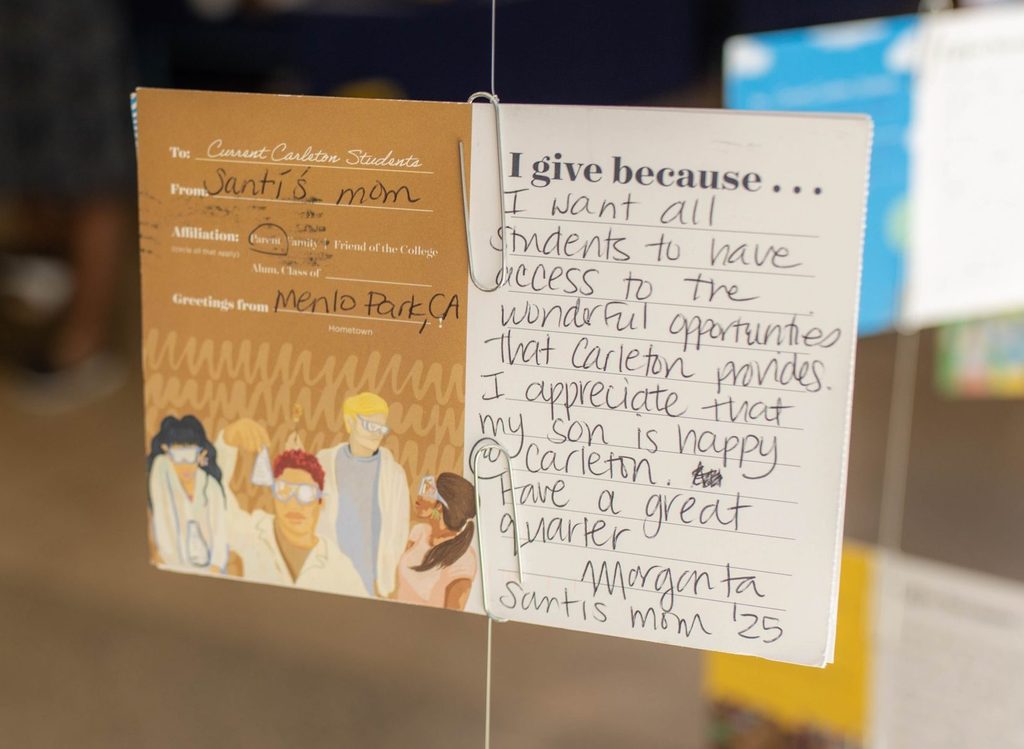 postcard that reads "i give because...I want all students to have access to the wonderful opportunities that Carleton provides. I appreciate that my son is happy @ Carleton. Have a great quarter" signed by Maragarita Santis, Mom ’25