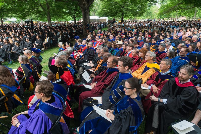 Faculty seated at a commencement ceremony