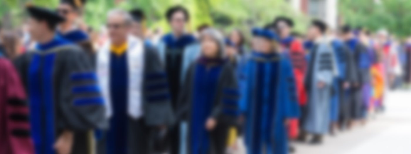Blurred image of faculty in procession
