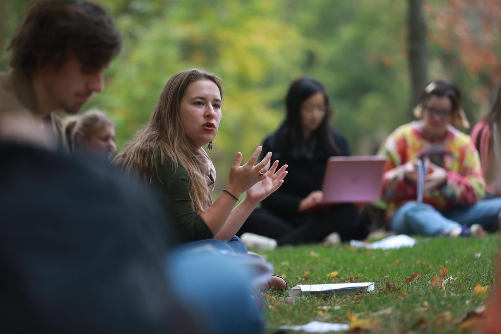 Professor Meredith McCoy teaching a class outdoors