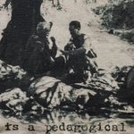 A black and white, historical photograph of two men sitting in the shade of a tree is translated into the medium of tapestry. Black text in a typewriter font runs across the bottom and reads “It is a pedagogical task”.