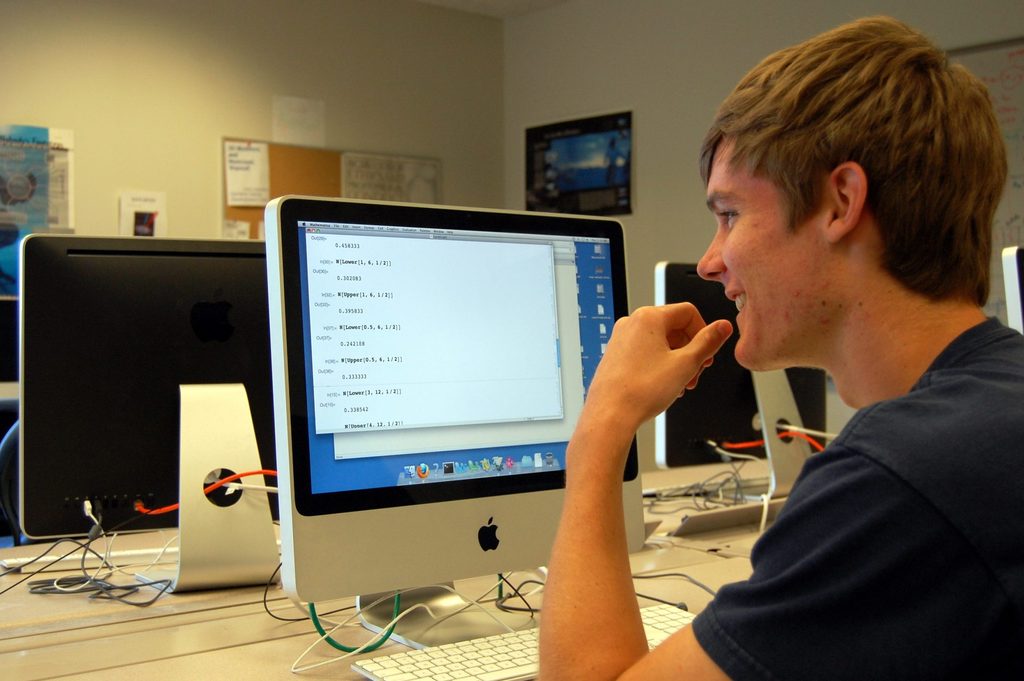 A student looks at a computer screen