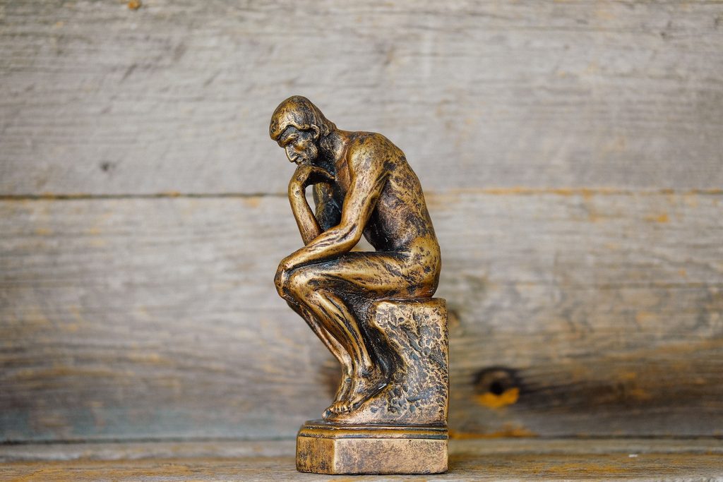 Small figurine of Auguste Rodin's sculpture, The Thinker