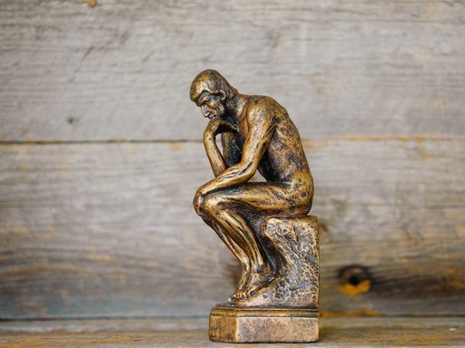Small figurine of Auguste Rodin's sculpture, The Thinker