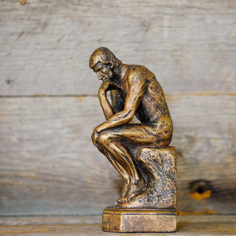 Small figurine of Auguste Rodin's sculpture, The Thinker