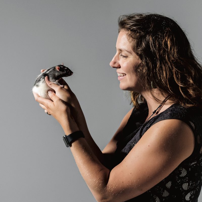 Psychology professor Sarah Meerts holds a rat