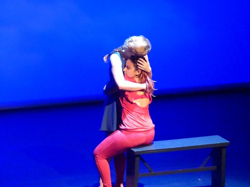 Two dancers hugging
