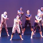 Dancers standing on stage