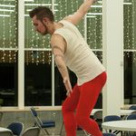 A dancer standing on a table