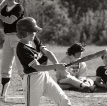 Bandick mid swing on the softball diamond.