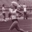 Anna runs on the Carleton outdoor track