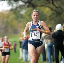 Funke-Harris running through a grass course