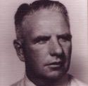 McGraw poses straight faced for a headshot