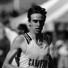 Virnig runs at an outdoor track meet