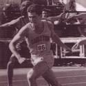 Casper runs with a long stride on the outdoor track