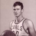 Terwilliger poses holding a basketball for media day