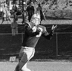 Lundsten, #43, looks up while running towards the approaching football