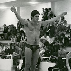 Potts raises arms in preparation for a dive