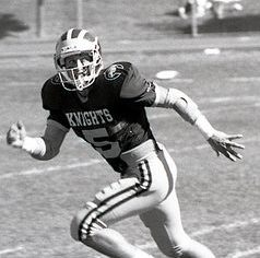 Thull, #5, runs down the field looking to catch the football