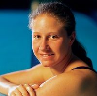 Marsman posed next to lane dividers in the pool, smiling at camera