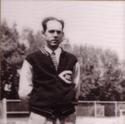 Diebold stands outside, hands behind his back