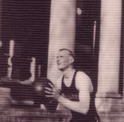 Perrin prepares to make a jump shot, playing basketball outside