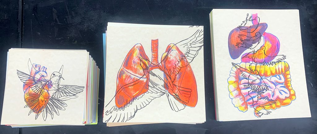 three stacks of risograph prints
