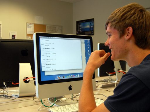 A student looks at a computer screen