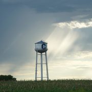 Carleton water tower under cloudy skies