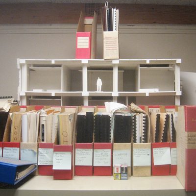 boxes, folders, and binders in an office