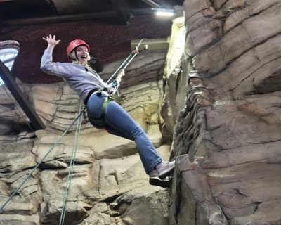 Kim- rock climbing