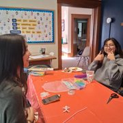 First Year Brisa Gomez '29 and Peer Leader, Rimona Zhang connecting over crafts at the Study Break #2 event