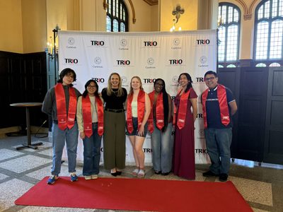 Kim Hildahl at the Senior Recognition event with her TRIO advisees (from the left to the right): Yoel Izaguirre '26, Evelyn Ponce '26, Kim Hildahl, Heidi Mc Kim '26, Shamya Franklin '26, Miah Francis '26, and Carlos Trejo '26