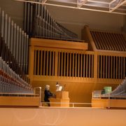 A woman playing an organ