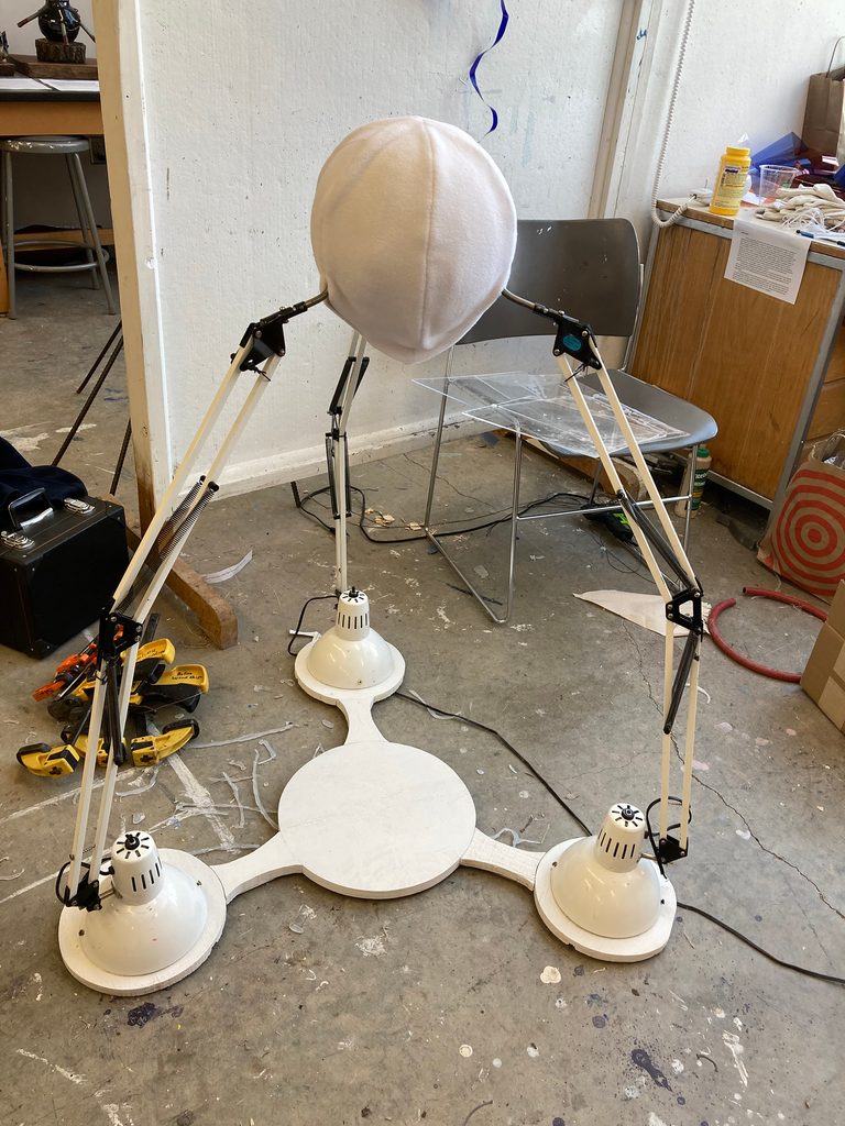 Abstract sculptural object made from lamps and other found objects