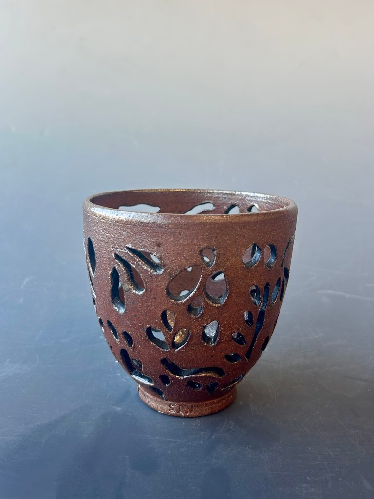 Soda fired ceramic colander