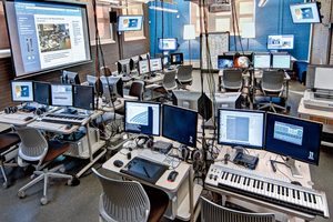 The Carleton IdeaLab, a space filled with computers, monitors, keyboards, projectors, and other technology