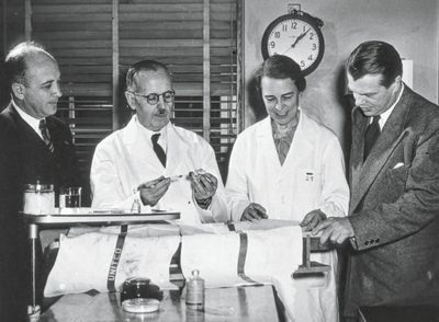 Scientists in suits and lab coats