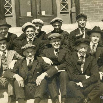 Students lounging on the front steps of Laird - 1920